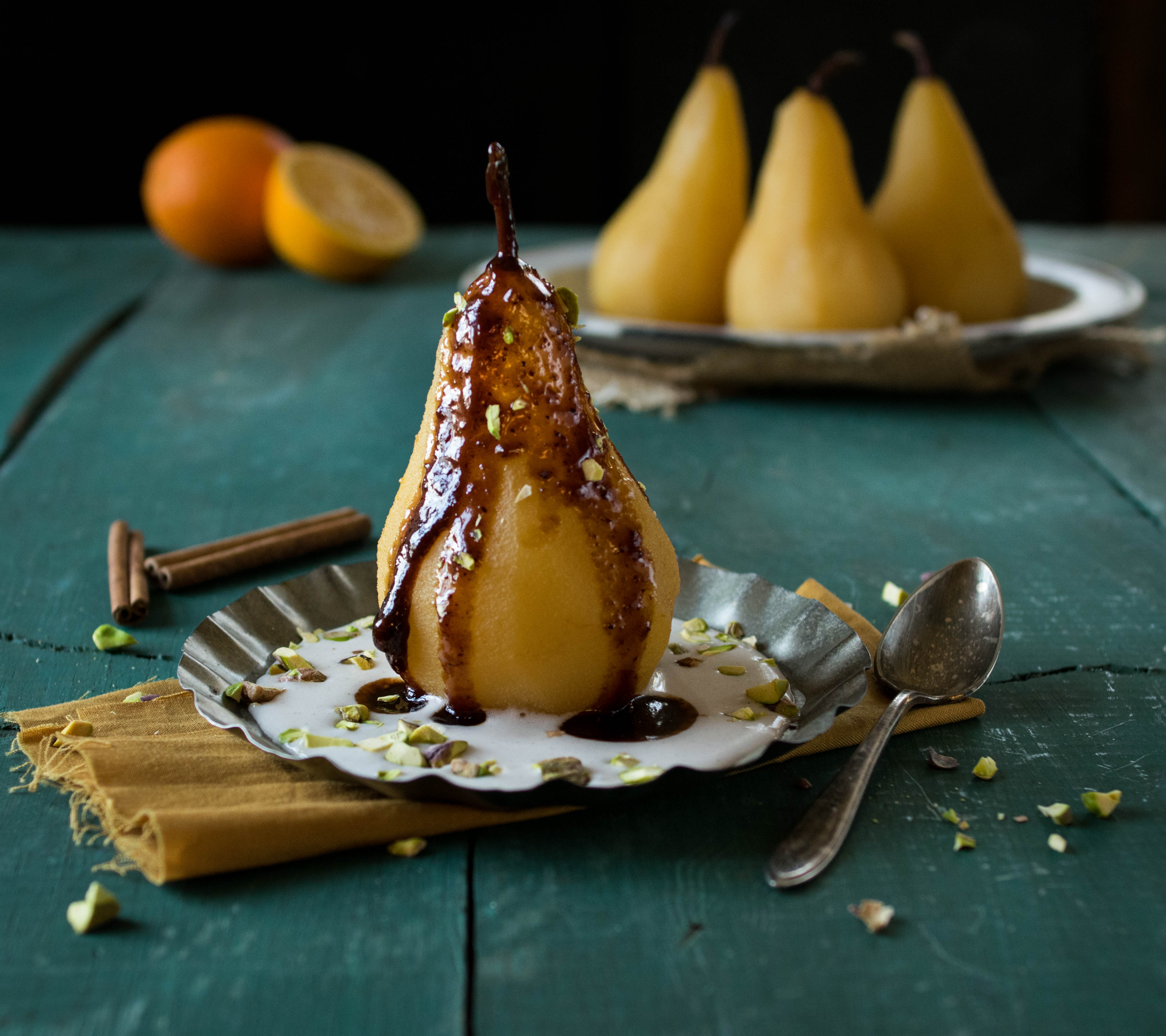 Orange Chai Poached Pears With Cardamom Coconut Cream