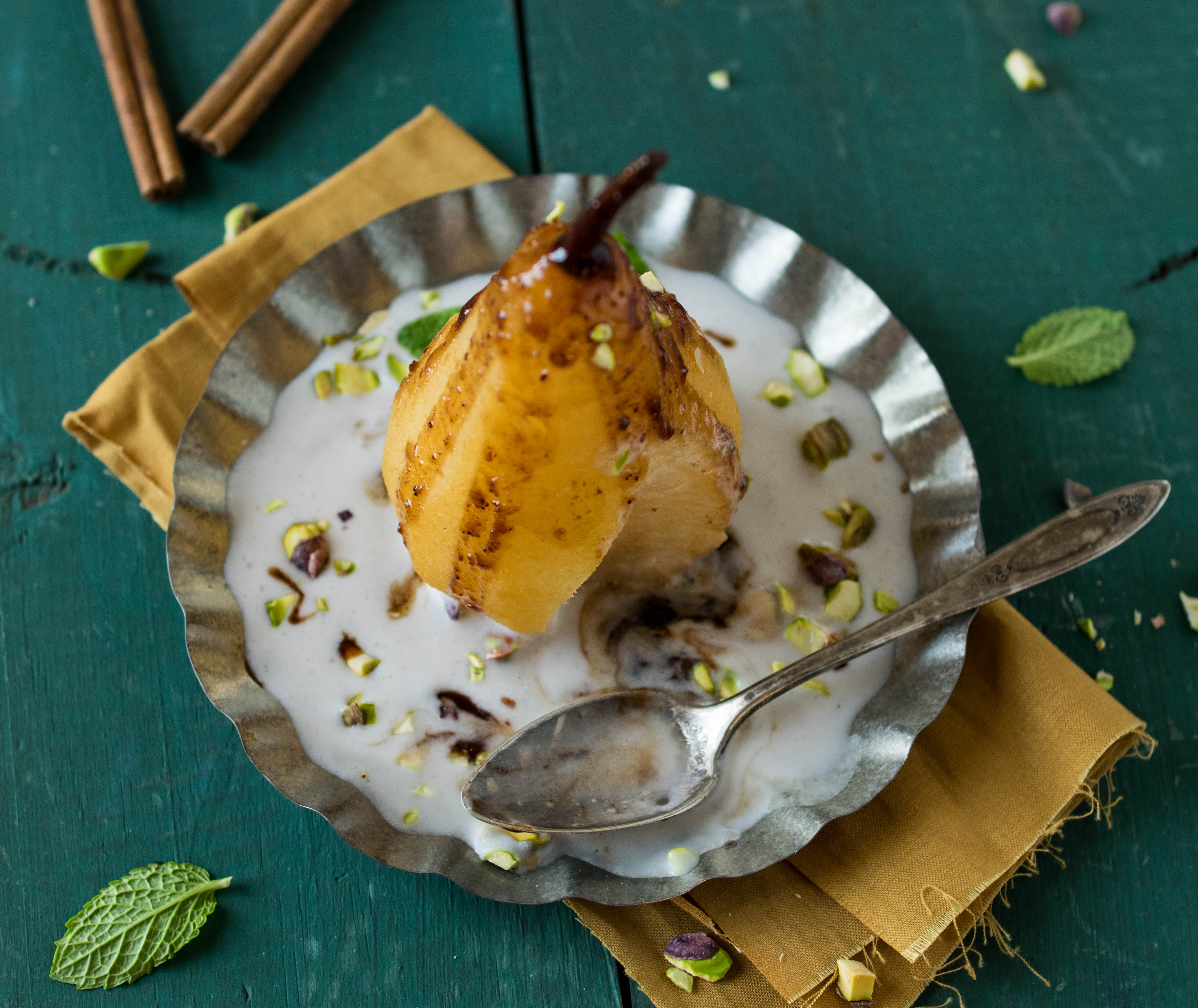 Orange Chai Poached Pears With Cardamom Coconut Cream